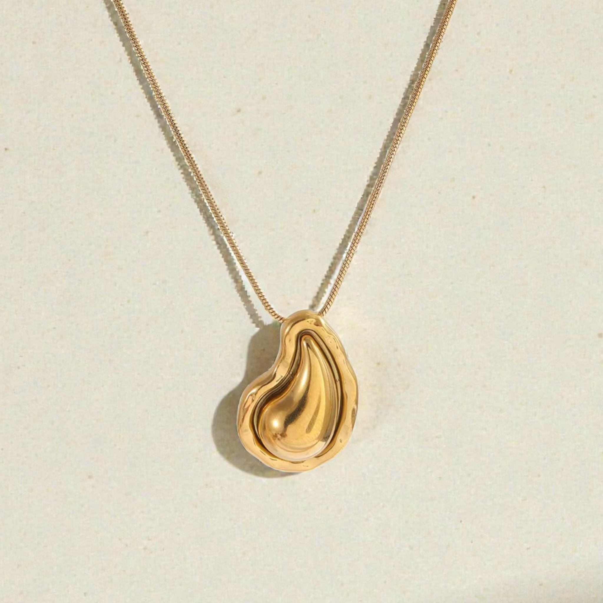 Collier et boucle d'oreille Goutte