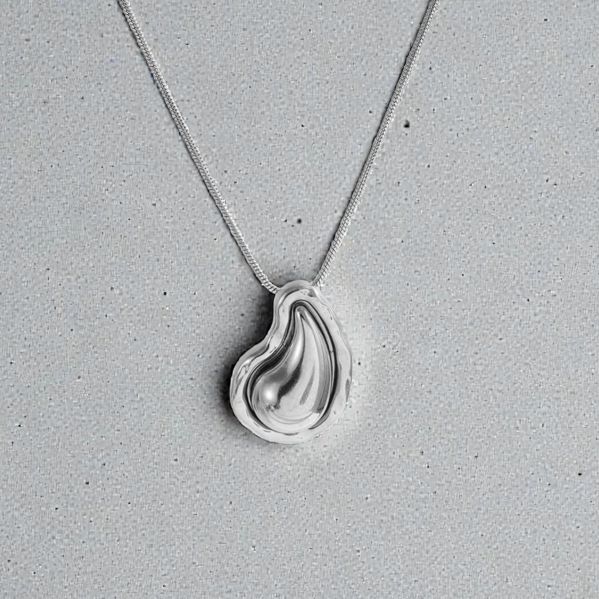 Collier et boucle d'oreille Goutte